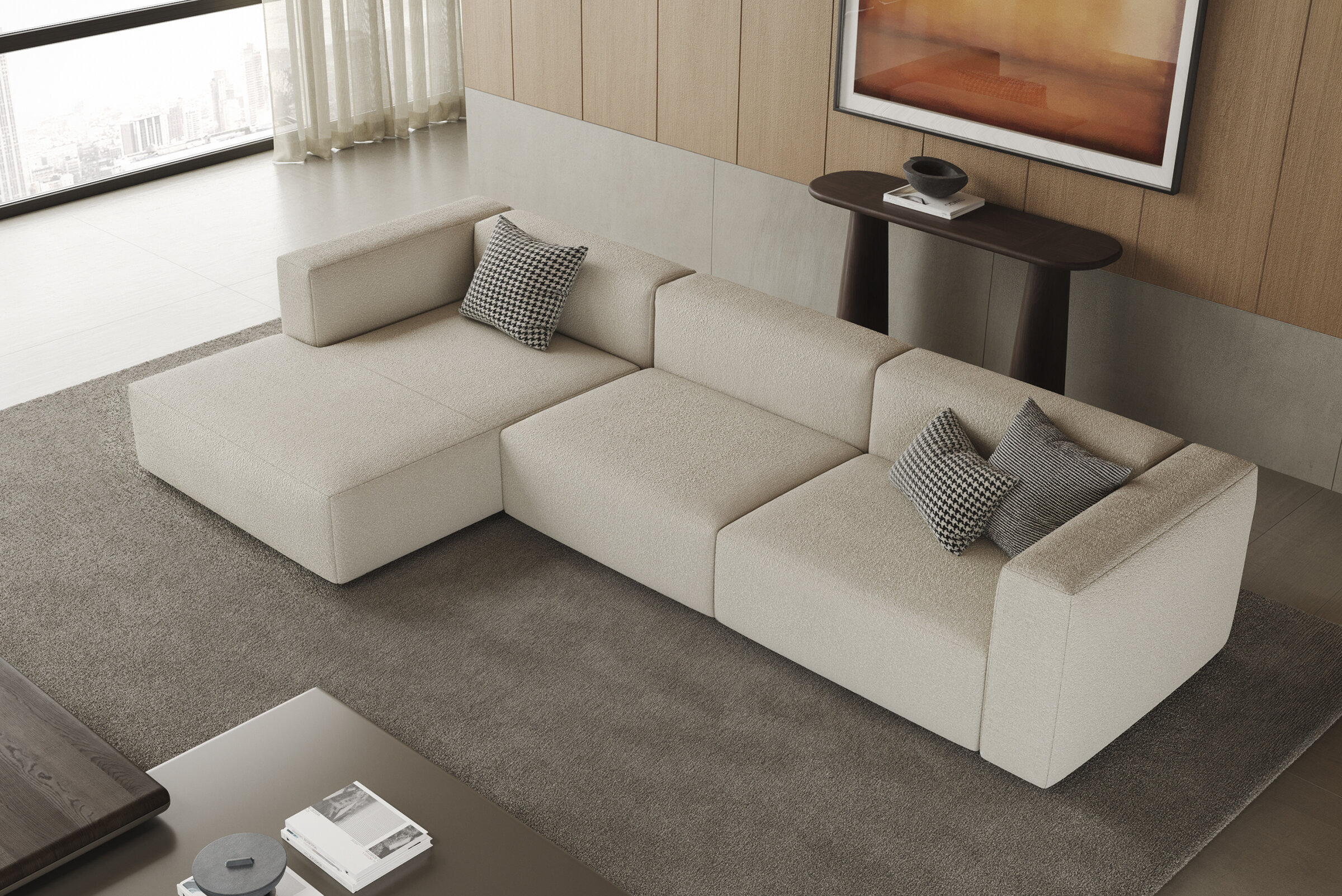 Elegant beige sectional sofa with two decorative pillows in a contemporary living room setting, perfect for stylish and comfortable home interiors.