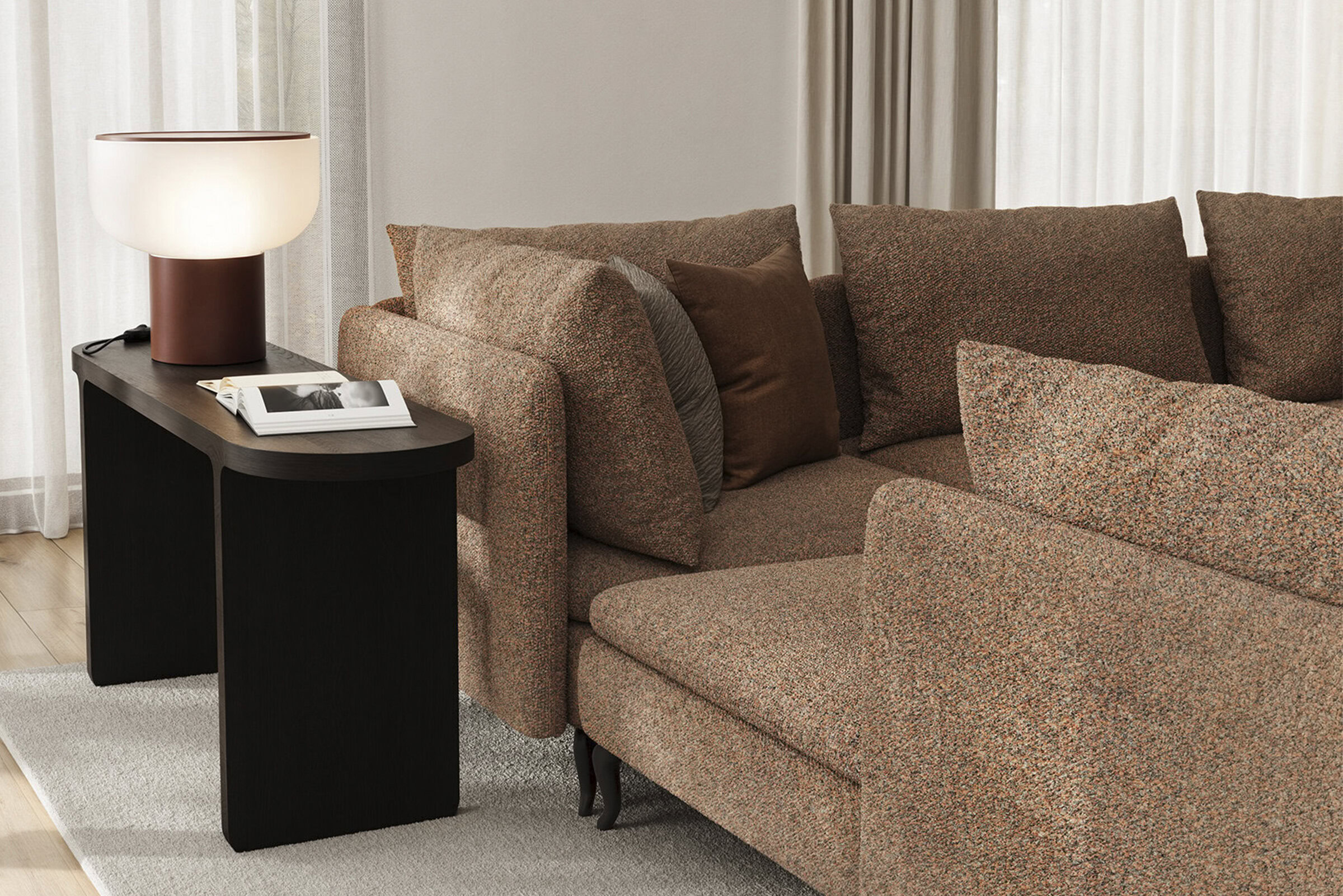 Comfortable upholstered sectional sofa with plush cushions, ideal for modern living rooms and home décor.