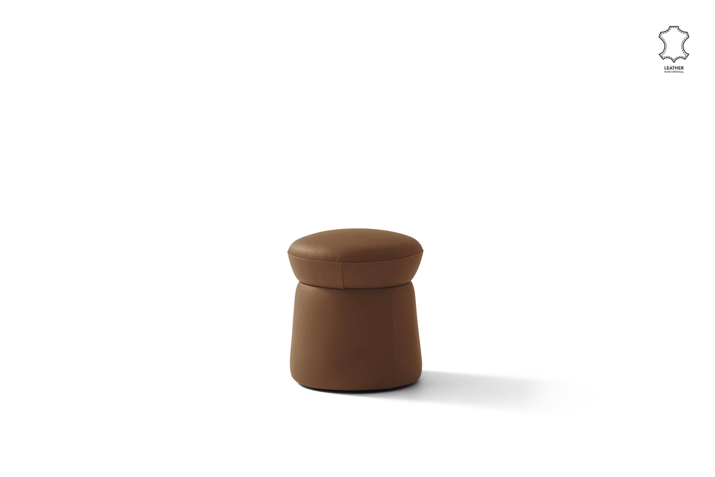 Suede leather ottoman in warm brown, stylish and comfortable, ideal for modern living room decor or as a statement piece in contemporary furniture collections.