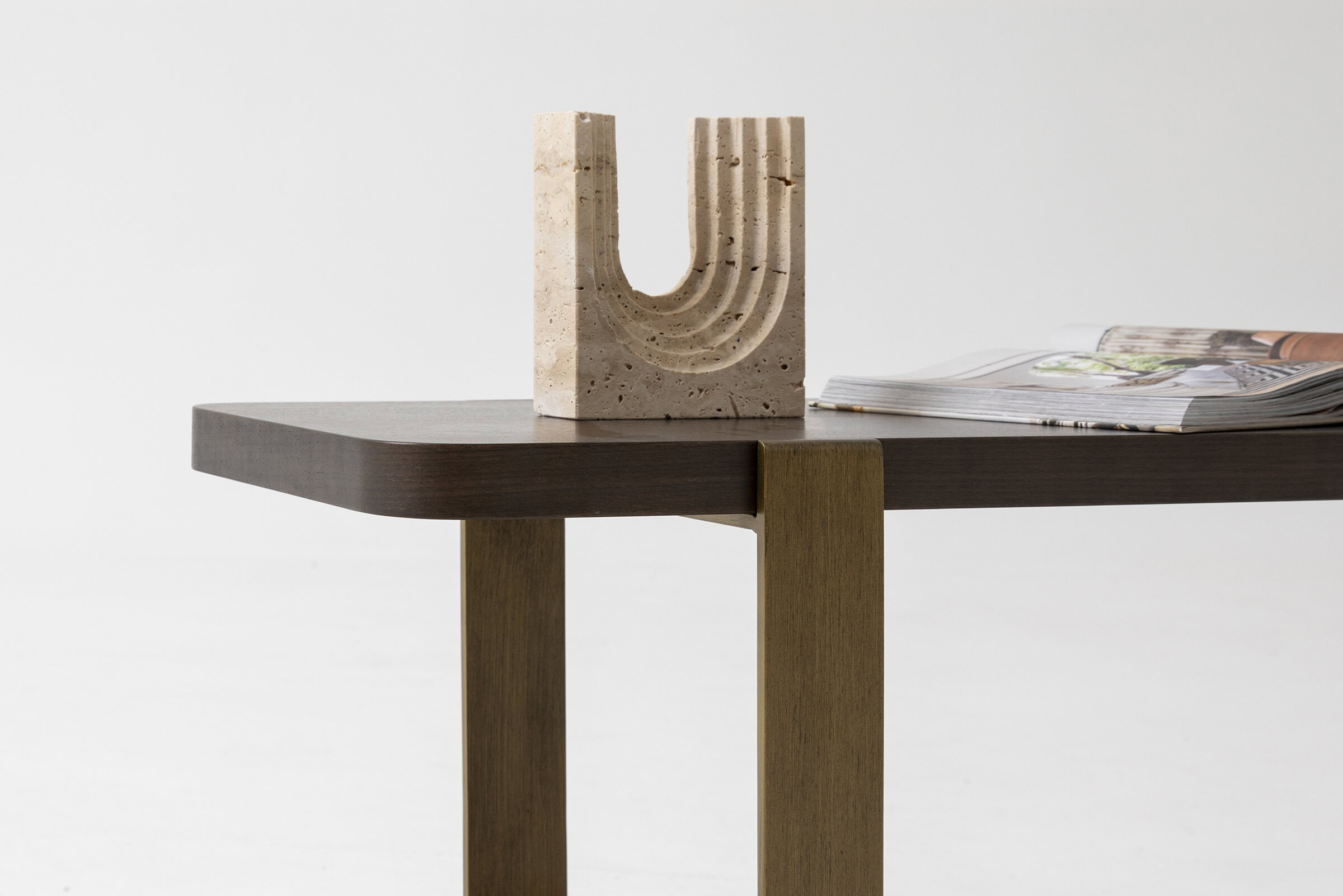 Sleek modern wooden dining table with dark and light wood finish, minimalistic design, perfect for contemporary home decor.