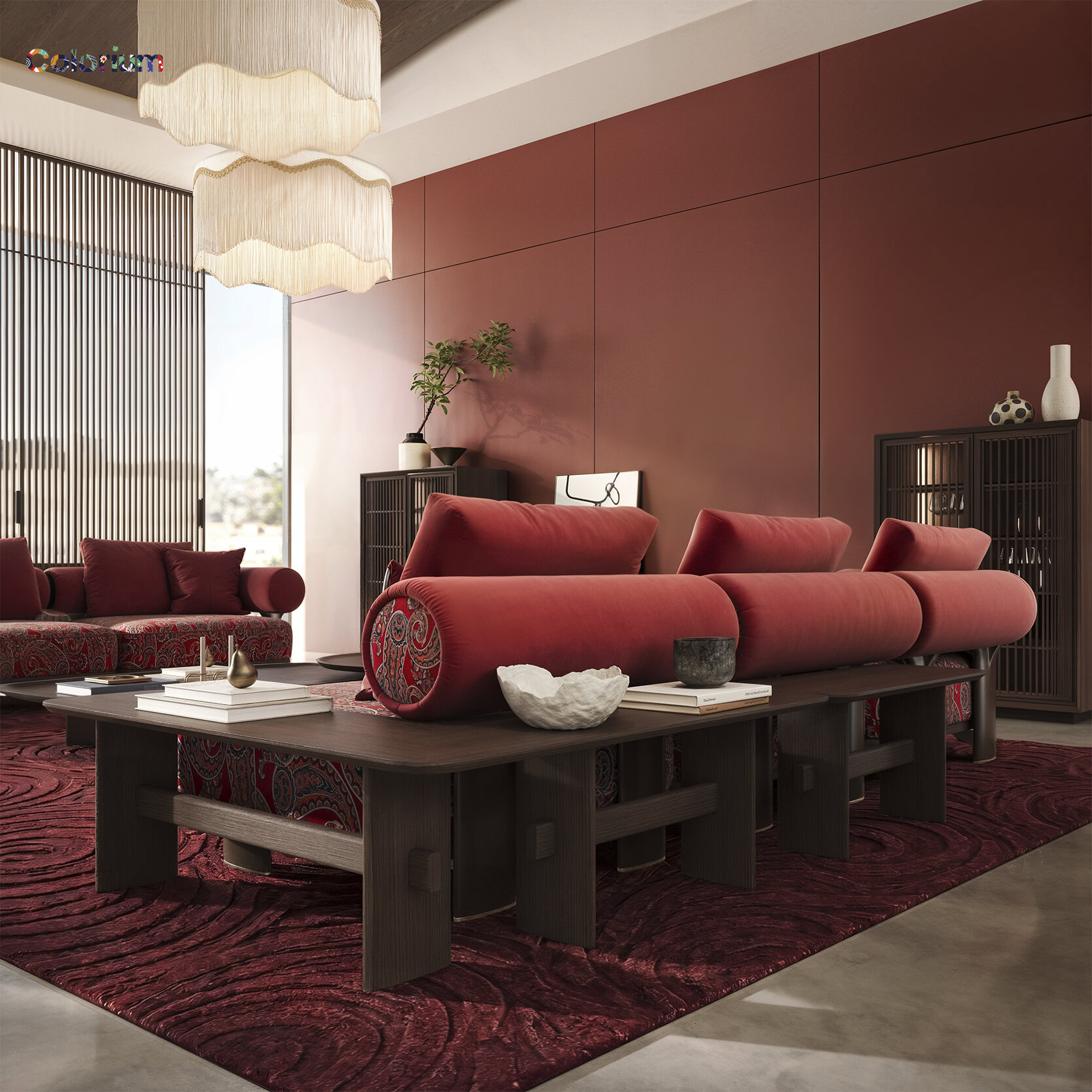 Luxurious red velvet sofa with unique rolled arm design, paired with a dark wooden coffee table, in a contemporary living room with warm tones and stylish decor.