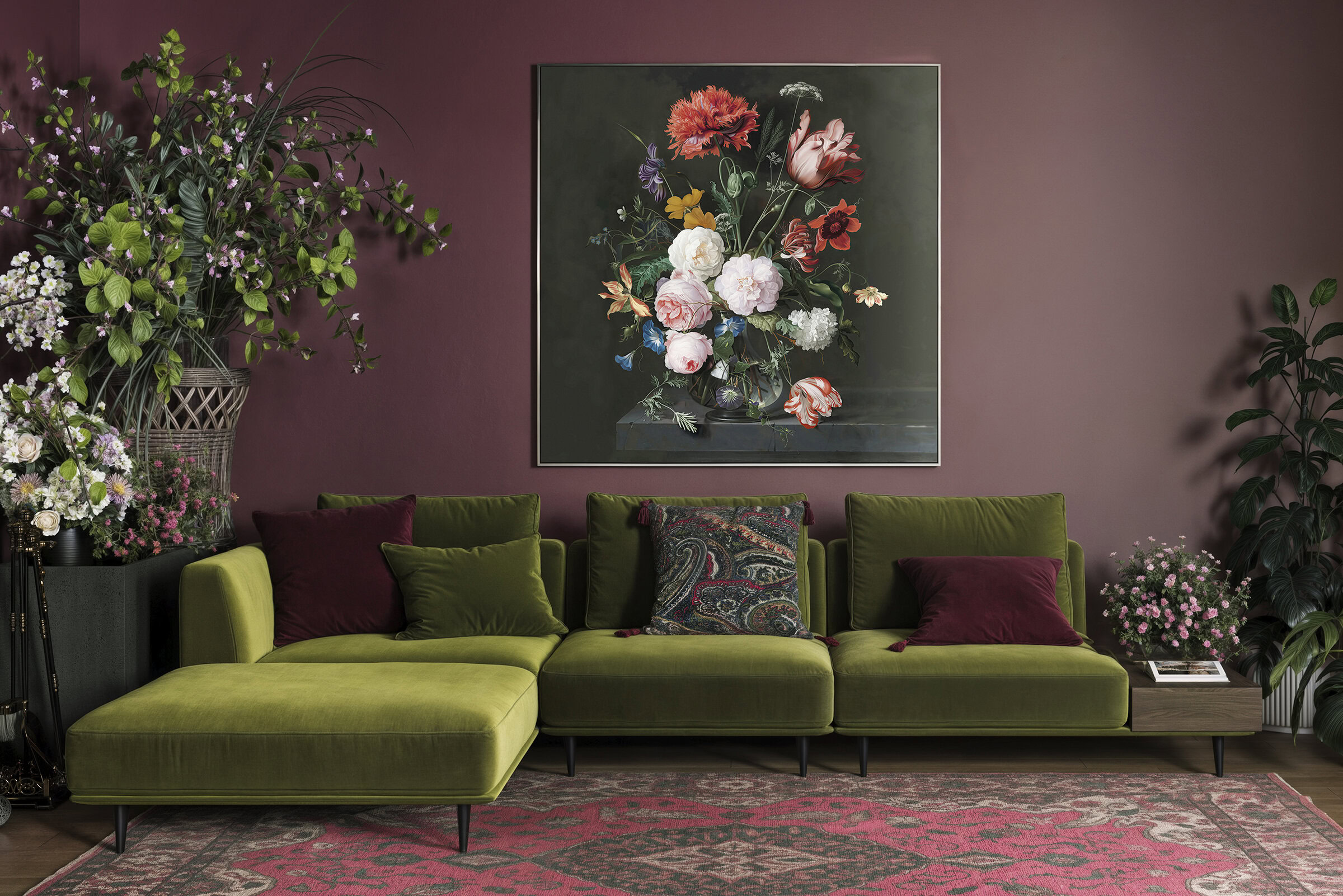 Elegant green velvet sofa with plush cushions in a stylish living room featuring floral artwork and lush plants, perfect for contemporary interior design.