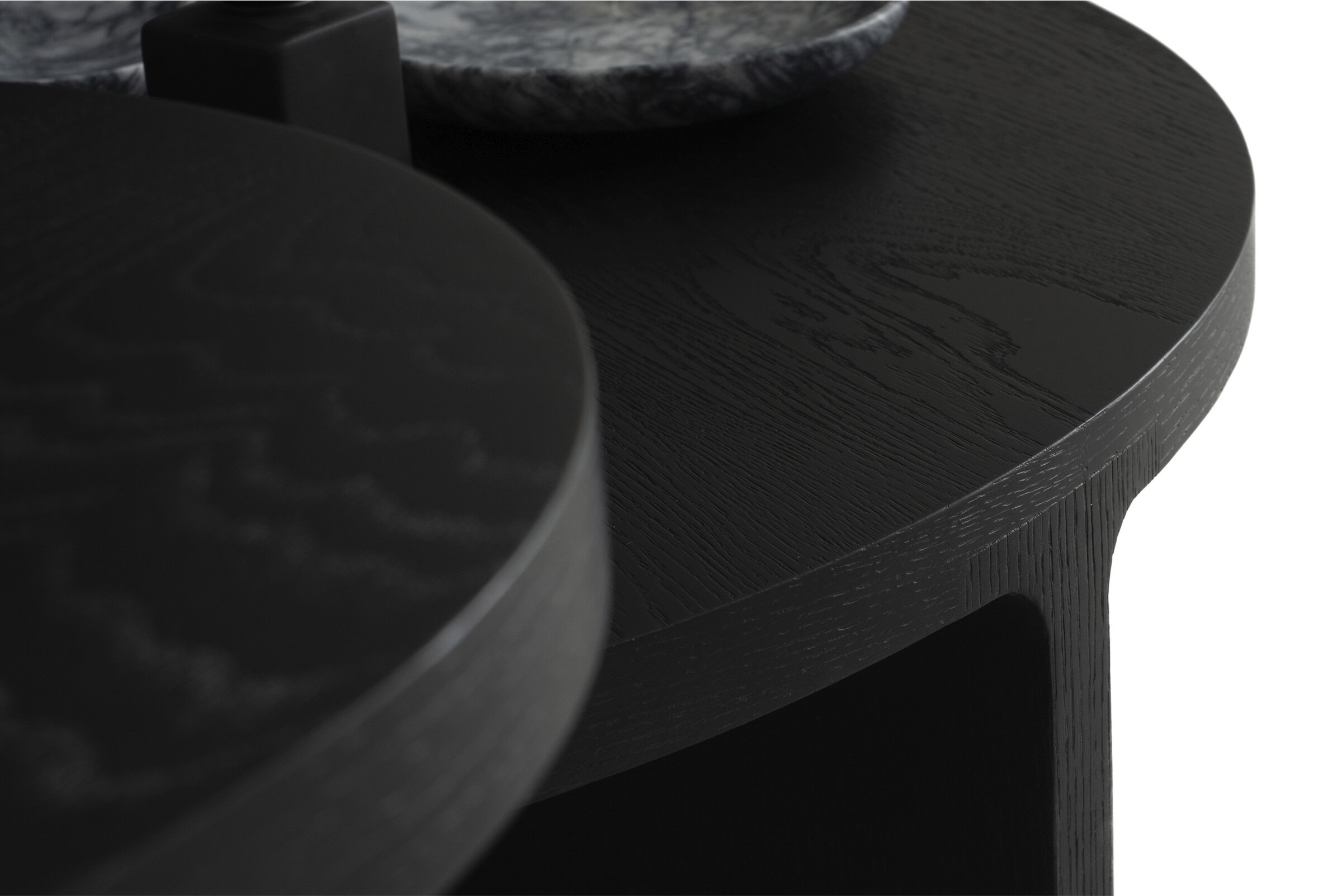 Smooth black wooden table top showcasing premium craftsmanship and elegant design for modern living spaces.