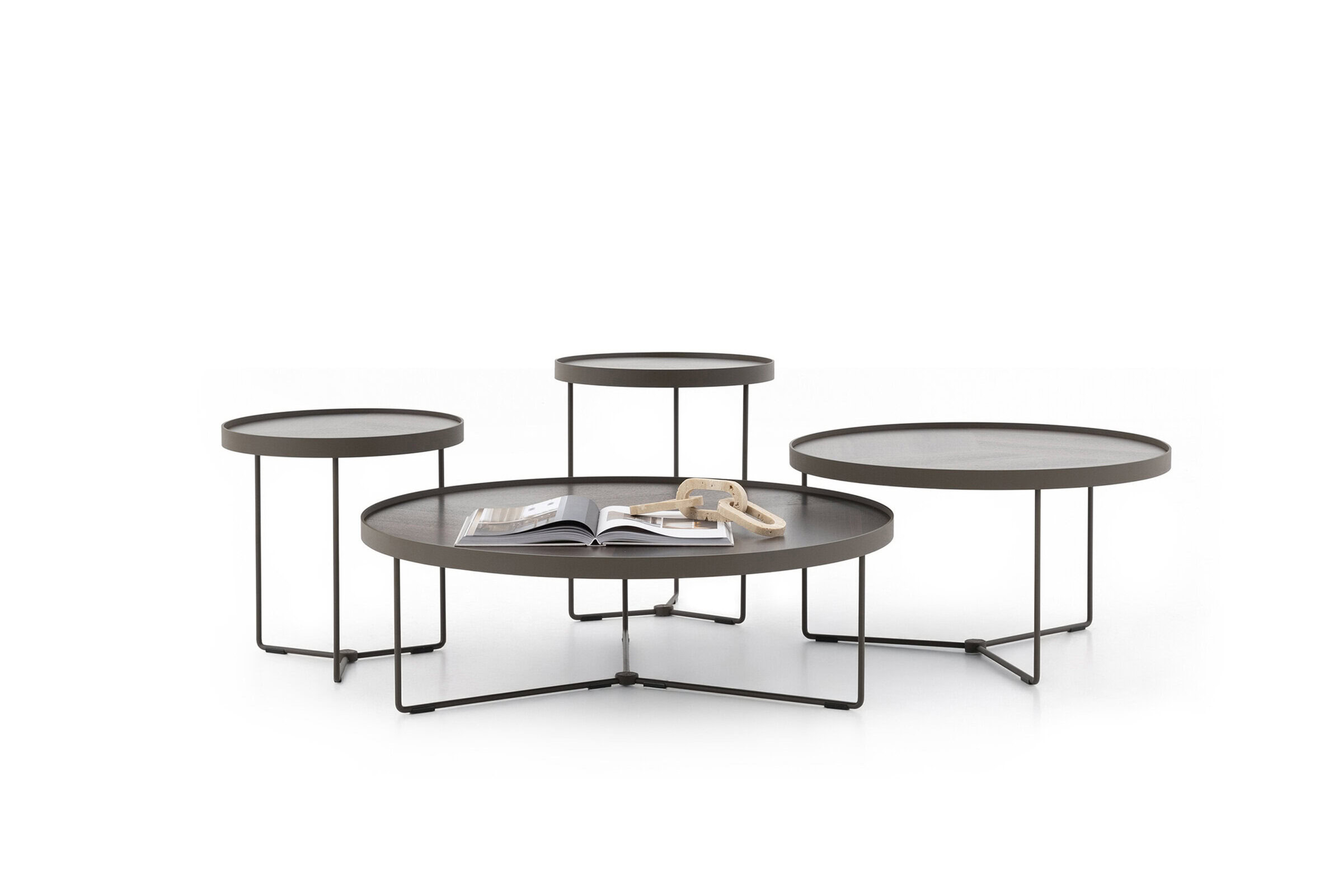 Contemporary multi-tier coffee tables with black metal frames and round surfaces, perfect for modern living rooms and stylish decor.