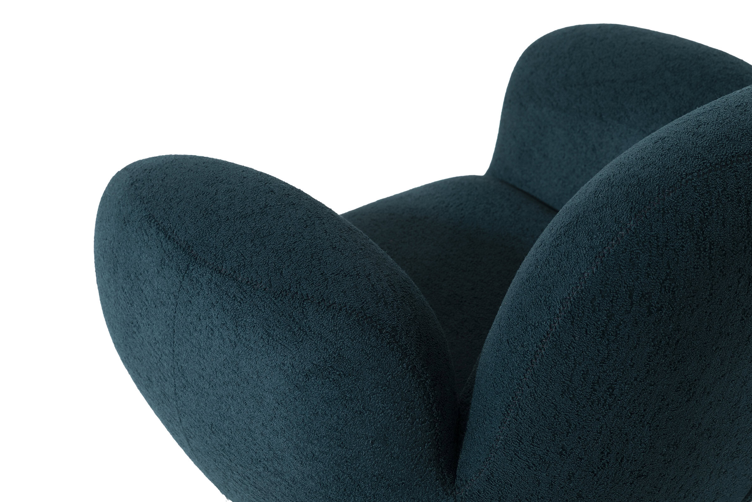 Luxurious teal upholstered armchair with soft textured fabric, modern design perfect for contemporary living spaces.