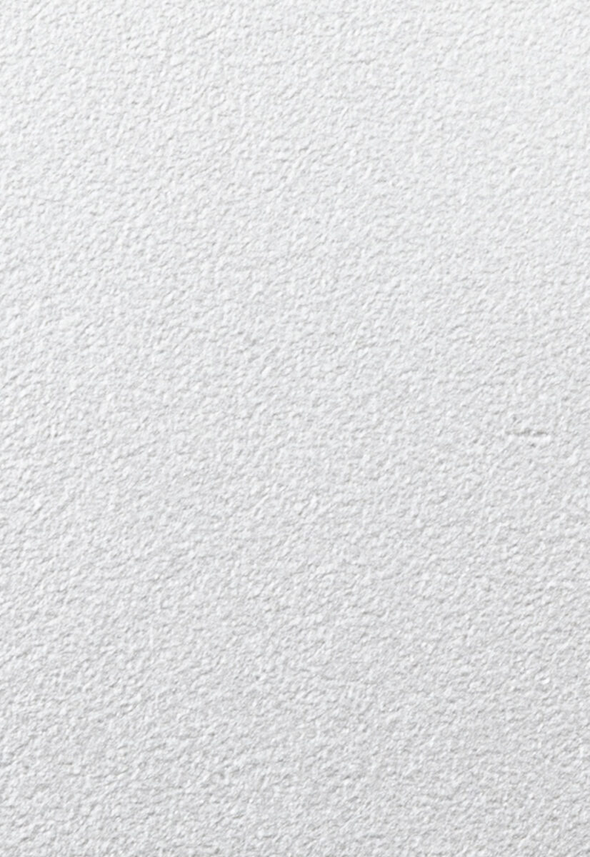 Sleek white textured wall surface ideal for modern interior design and furniture backgrounds.