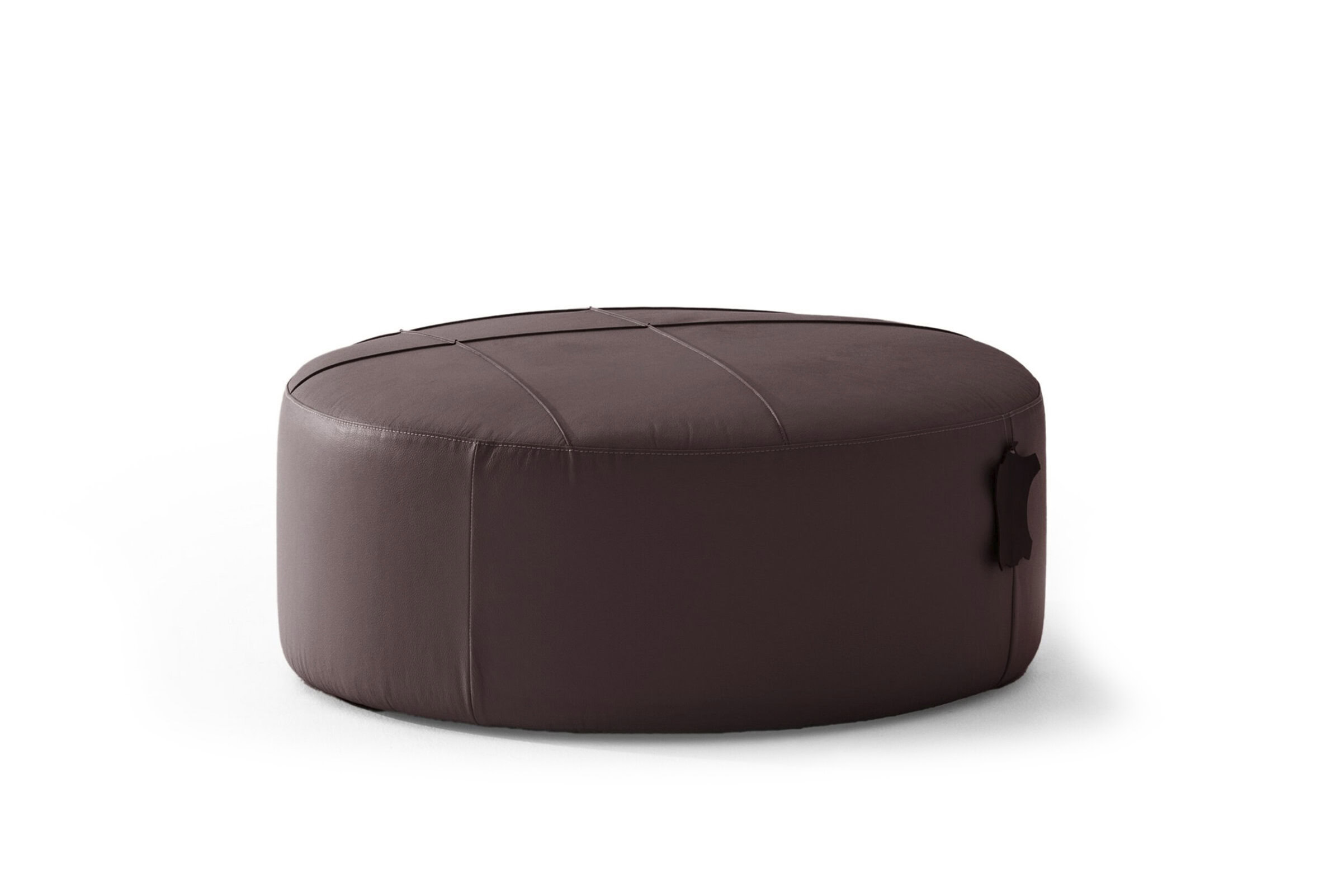 Plush brown leather ottoman with stitched details, versatile and stylish for living room decor. Perfect addition for comfort and modern aesthetic in furniture design.