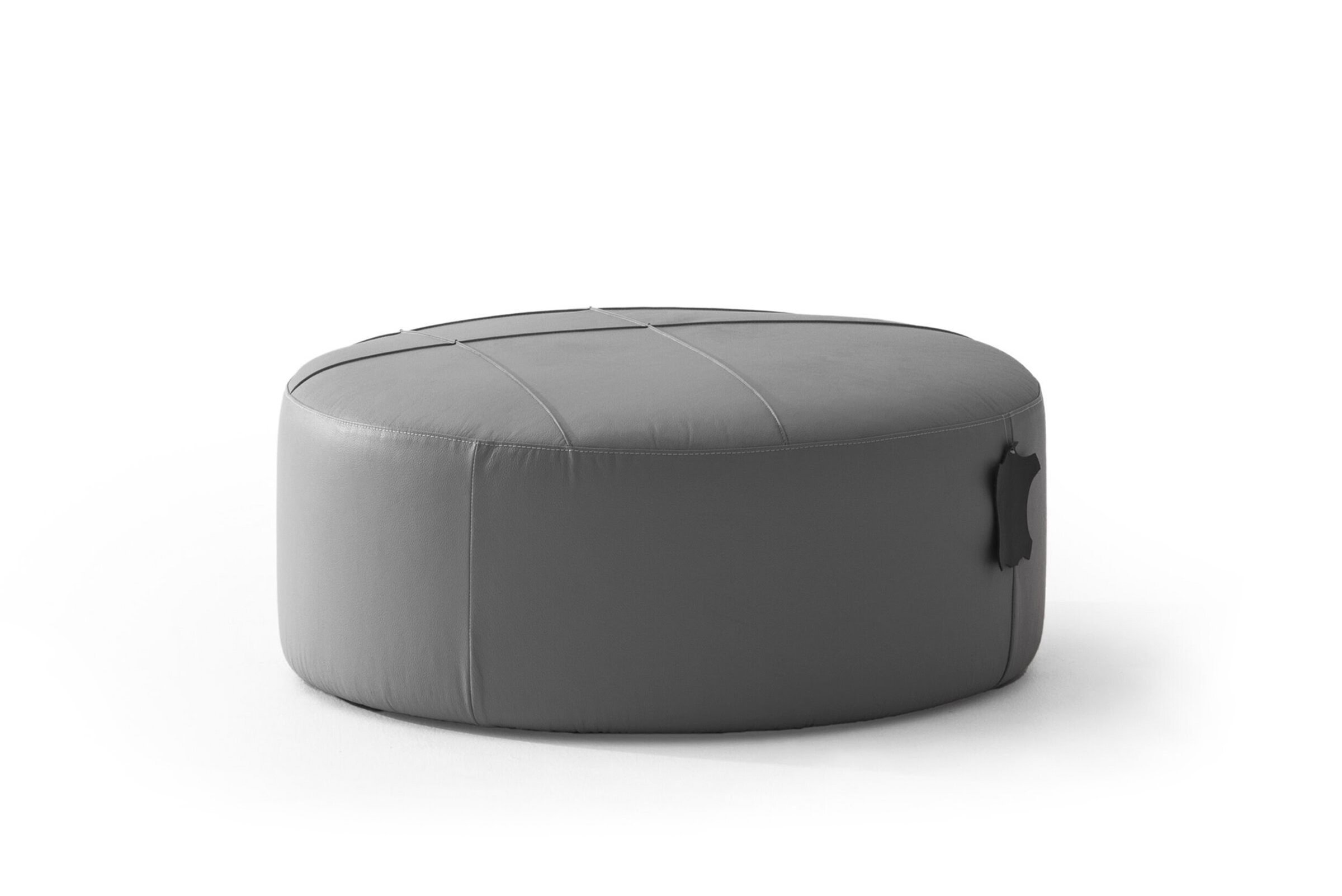 Modern grey leather ottoman with sleek stitching and handle, perfect for contemporary living rooms, providing style and versatile seating options.