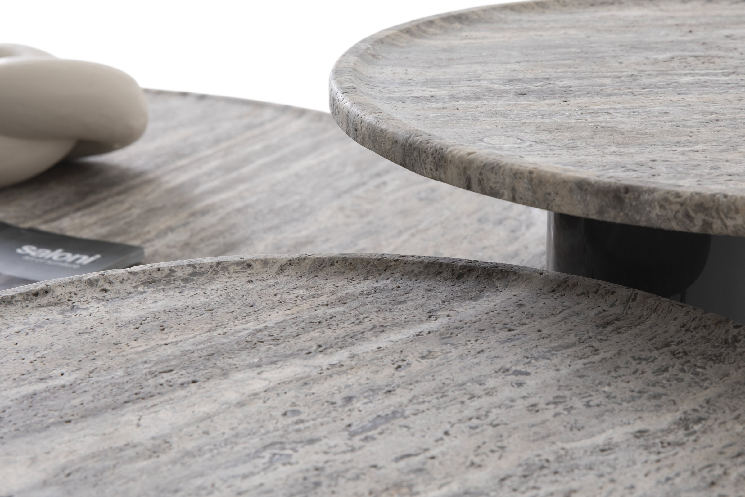 Slate-gray marble coffee tables with textured surfaces and rounded edges, showcasing elegant and modern furniture design. Perfect for contemporary living rooms and stylish interiors.